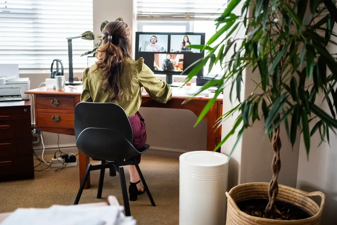 Remote worker on video call in home office